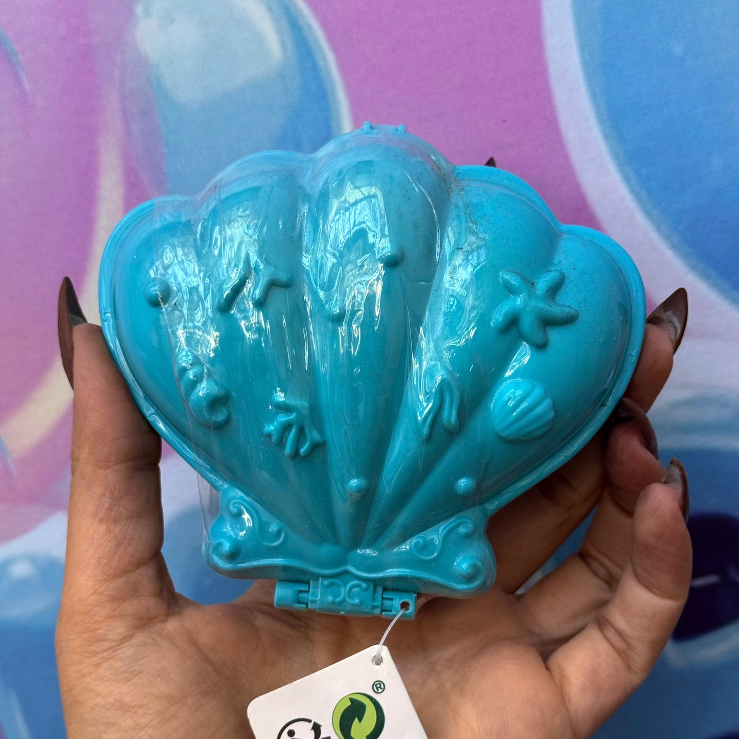 Mini World Pocket – Brinquedo Surpresa em Forma de Concha com Mini Mundo Dentro